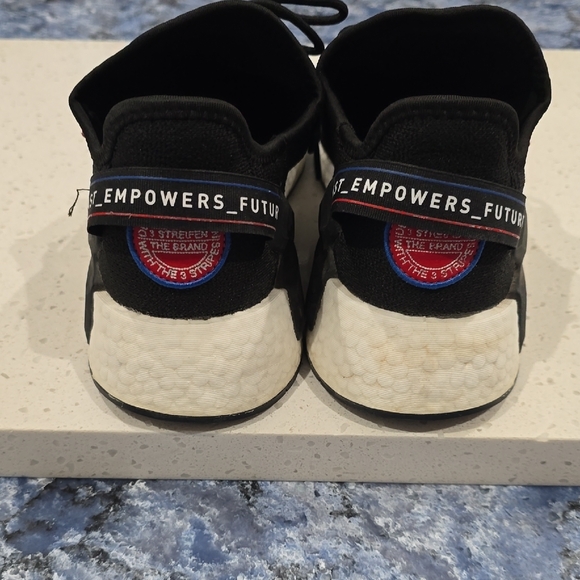 Adidas NMD Black Sneakers with Red and Blue Highlights